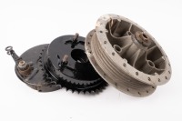 NORTON: A Norton Atlas rear wheel hub, rear sprocket / brake drum, rear brake backing plate