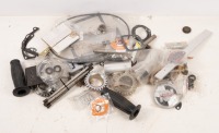 NORTON: A group of assorted new Norton parts, includes such things as tank badges, one cable, exhaust nut, ignition coil etc&nbsp;