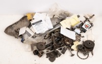 TRIUMPH: A group of assorted Triumph parts, includes timing covers, tank rack, new number plate bracket, timing gears, a cam, s/arm brake pedal etc