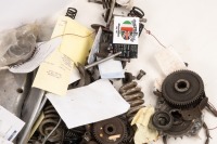 TRIUMPH: A group of assorted Triumph parts, includes timing covers, tank rack, new number plate bracket, timing gears, a cam, s/arm brake pedal etc - 2