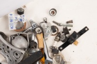 NORTON COMMANDO: A group of assorted Norton Commando parts, includes a chain guard, z brackets, brake lever, tappet covers etc - 2