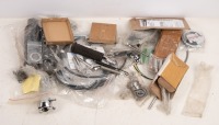 NORTON: A group of assorted new Norton parts, includes badges, stickers, sprocket, valves, cables and cylinder head stud mount kit
