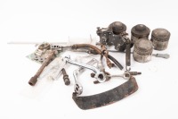 TRIUMPH: A group of Triumph pre unit assorted parts, includes new tank mount kit, new gearbox mount & bolt, kick start lever, foot peg, twin carb inlet manifold etc