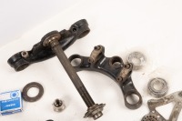TRIPLE CLAMPS: A group of assorted Norton triple clamps & pieces - 2
