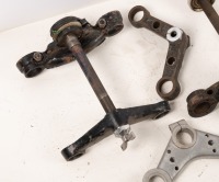 TRIPLE CLAMPS: A group of assorted Norton triple clamps & pieces - 3