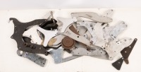 PLATES: A group of assorted engine gearbox mount plates, mostly Norton