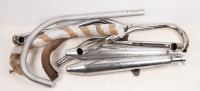 NORTON EXHAUSTS: A group Norton exhausts