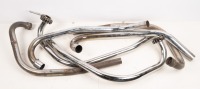 TRIUMPH EXHAUSTS: A group of assorted Triumph exhaust header pipes