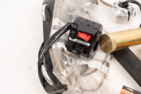 AUTOJUMBLE: A group of assorted parts, includes new side stand mount bracket, switch block, assorted rubbers, etc - 3
