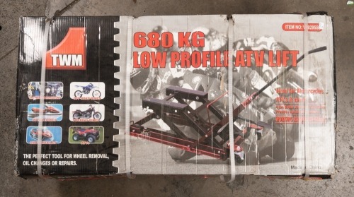 LOW PROFILE LIFT: A new in box TWM 680kg low profile ATV motorcycle lift