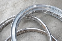 WHEELS & TYRES: Two tyres & three rims (two Dunlop steel rims, one alloy), one new K81 360H19 size tyre and other is used Avon MkII rear tyre - 2