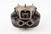 NORTON: A Norton Atlas cylinder head with clamps screwed in