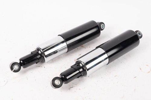 SHOCK ABSORBERS: A pair of new rear shock absorbers, to suit British makes, 30cm centre to centre