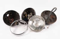 HEADLAMPS: A group of assorted headlamp buckets, one rim and one reflector