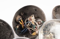 HEADLAMPS: A group of assorted headlamp buckets, one rim and one reflector - 2