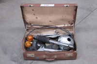 A collect of miscellaneous parts believed to have come from a late 1960s-early 1970s Triumph