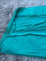 ASTON MARTIN: A large green fabric cover with padded sides made to suit a large car, used on an Aston Martin AMV8 / DBS [Location: Melbourne] - 5