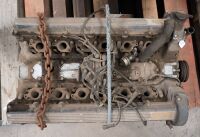 JAGUAR: A circa 1970s Jaguar V-12 engine, with distributor cap, sump & flywheel, stamped '7P5078SB" [Location: Melbourne]