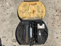 JAGUAR: A pair of incomplete tool kits to suit 1960s models, one metal and one plastic, each with some tools as shown in the photographs [Location: Sydney]