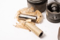 BUGATTI: A box of numerous Bugatti pistons, width 6cm [Location: Melbourne] - 2