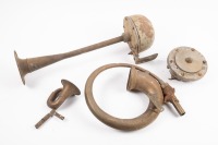 HORNS: Four early horns, includes three brass horns and one unknown horn, [Location: Melbourne]