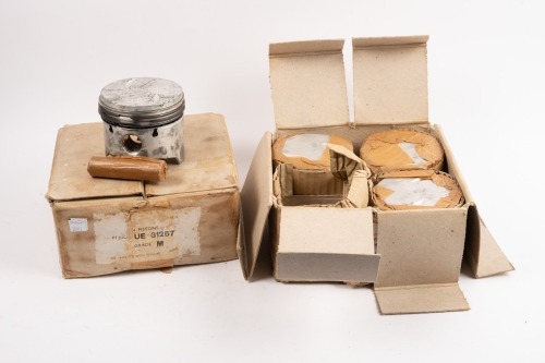 ROLLS-ROYCE: A group of eight NOS Rolls-Royce pistons (grade M) [P/N UE 31257], four pistons in two boxes, thought to suit Rolls-Royce or Bentley 6.25L V8 models. With a box of eight NOS Rolls-Royce piston liners [Location: Melbourne]