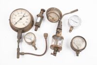 GAUGES: A group of seven early car & industrial mostly pressure gauges, [Location: Melbourne]