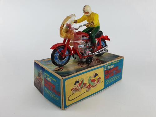 RACING: Boxed CHAMPION U Turn Motor Cycle by SJM Japan c1970s, battery operated, RN27, 28 cms.