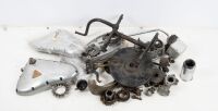 TRIUMPH: A group of assorted Triumph parts, includes pre unit & unit parts, includes steering damper, timing covers, etc