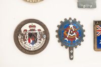 BADGE DISPLAY: A framed & glazed collection of ten mostly European touring club badges [Location: Melbourne] - 2