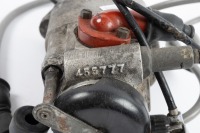 A Lucas twin magneto dated '8.54' and numbered 'K2F 42301A', with advance/retard lever, appears reconditioned - 2