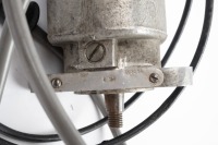 A Lucas twin magneto dated '8.54' and numbered 'K2F 42301A', with advance/retard lever, appears reconditioned - 3