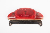 A Catalux Aprilia tail lense with metal bracket believed to been used on 1950s/1960s Moto Rumi