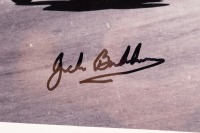 COOPER T51: A framed and glazed black and white photograph featuring Jack Brabham's Cooper T51 1959 Formula 1 World Championship car, photo hand signed by Jack Brabham - 3