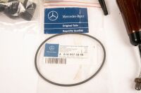 MERCEDES-BENZ: A group of assorted parts for W126 and W123 mostly being interior parts, includes items such as two W126 Burl gearshift knobs, W126 NOS Distributor seal Part No A0149975848, M103 ignition module, and others [Location: Melbourne] - 4