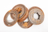 VELOCETTE: A box of Velocette parts, including clutch plates