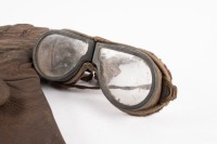ACCESSORIES: A pair of early leather motorcycling gloves marked 'V409 Made in Australia 1943 Size 9' and a pair of early goggles - 2