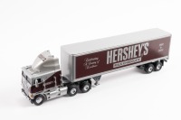FREIGHTLINER: A Matchbox Collectibles Freightliner tractor trailer model, comes in the Hershey's chocolate bar 100th anniversary livery, model number DYM38277 - 2