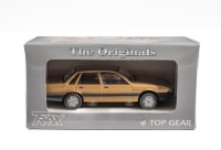 HOLDEN VL COMMODORE: A 1:43 scale Holden Commodore VL sedan, this one is finished in gold paintwork, model number TR16