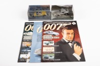 JAMES BOND: A pair of 1:43 scale models, an Aston Martin DB5 from Goldfinger, also an MGB from The man with the Golden Gun