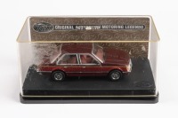 VC COMMODORE: A 1:43 scale Trax Holden VC Commodore SL/E sedan model, finished in two tone maroon & dark red paintwork, model number TR61