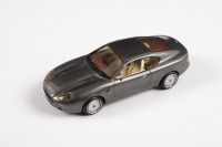 ASTON MARTIN: An SMTS 1:43 scale Aston Martin DB7 in grey (CL43) in box