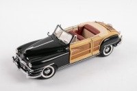 CHRYSLER: A highly detailed Franklin Mint 1:24 scale 1948 Chrysler Town & Country convertible in noel green colour with beige woodgrain sides