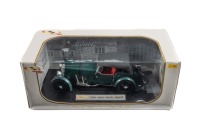 ASTON MARTIN MARK II: A 1:18 scale Signature 1934 Aston Martin MkII model, finished in dark green paintwork with a red interior, model number 18118