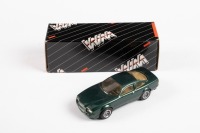ASTON MARTIN: A 1:43 scale white metal model of a 1989 Aston Martin Virage in dark green with beige interior, within box