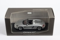 PORSCHE: A Minichamps 1:43 scale Porsche Carrera GT Spyder in silver, official Porsche product with Porsche branded cardboard wrap in original case
