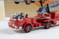 FIRE ENGINE: A Corgi American La France aerial ladder truck model, bearing the Orlando fire department livery, limited edition 3988/7500 pieces, model number 97324 - 2