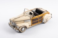 BUICK: A Retro Delights handmade tin 1941 Buick Woody convertible model, 37cm long