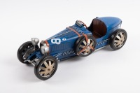 BUGATTI: A Retro Delights handmade tin 1920s Bugatti model in blue, 35cm long