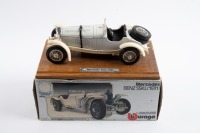 MERCEDES-BENZ: A Bburago 1:18 scale 1931 Mercedes-Benz SSKL in white, presented fixed on timber base with nameplate in original box